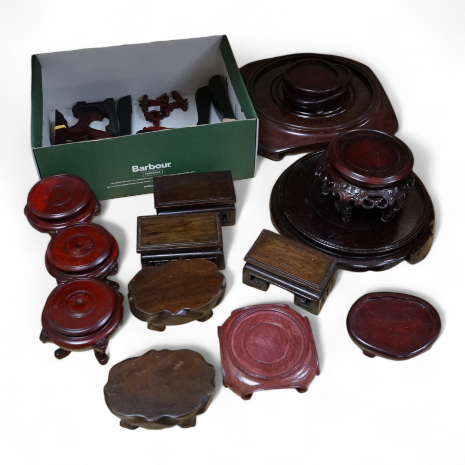 A collection of mixed Chinese wood stands. Largest 27cm wide. Condition - fair to good